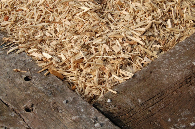 Wood chip ground covering