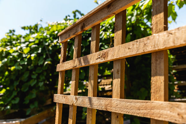 How to attach a trellis or lattice to a fence or wall