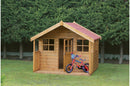 A wooden Jessicas Cottage playhouse with a red roof, Georgian windows, and a Georgian half-glazed door. A red and blue bicycle is parked in front of the playhouse.