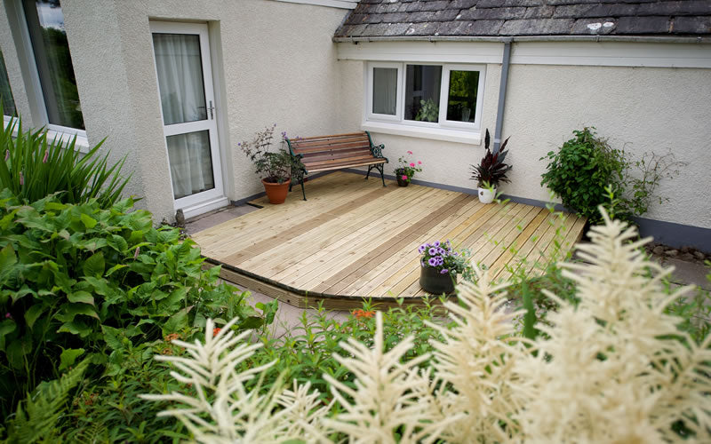 outside deck with garden bench